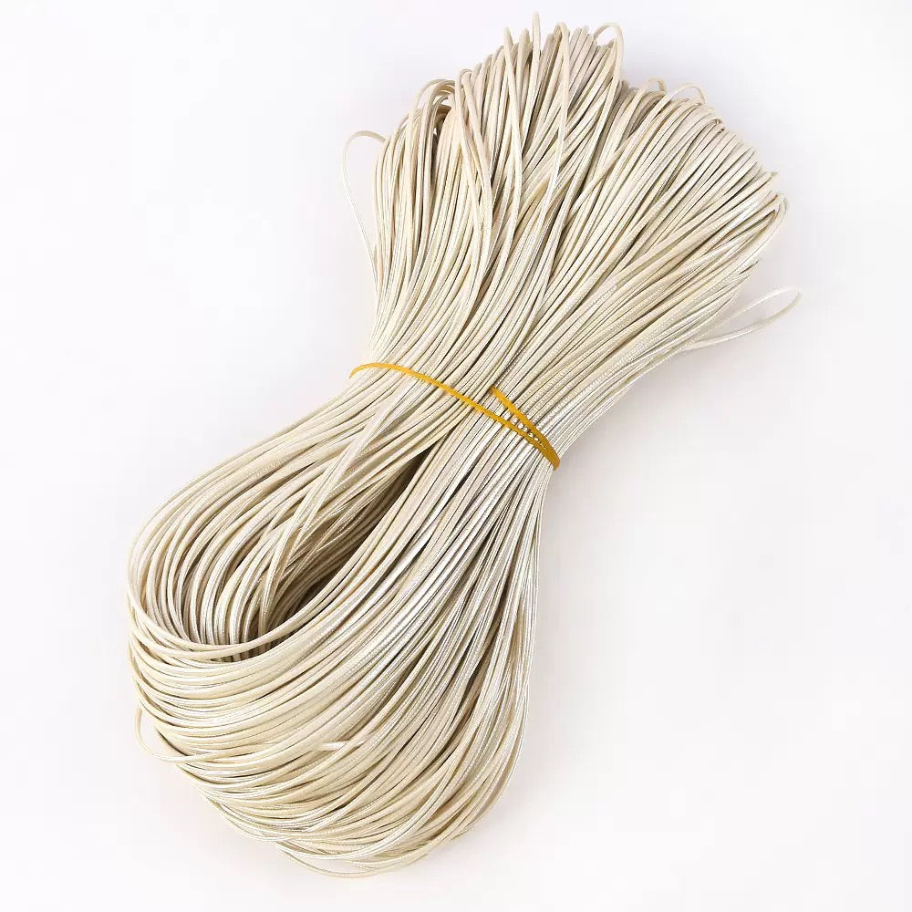 Flat shiny leather cord.