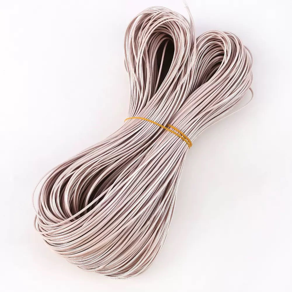 Flat shiny leather cord.